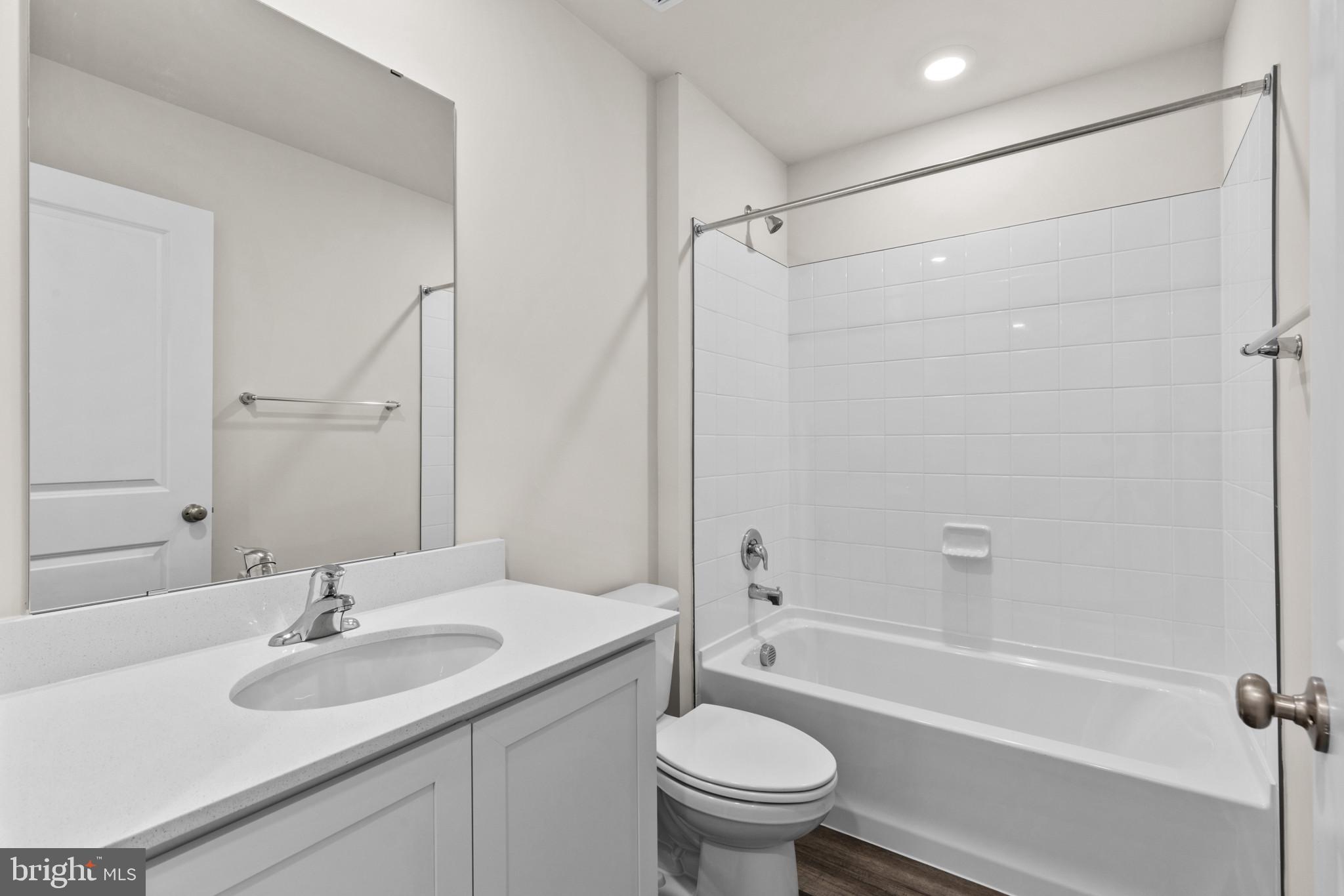 330 Hackley Drive Joppa, MD 21085 - Photo 19 of 32 a bathroom with a sink toilet and a bathtub