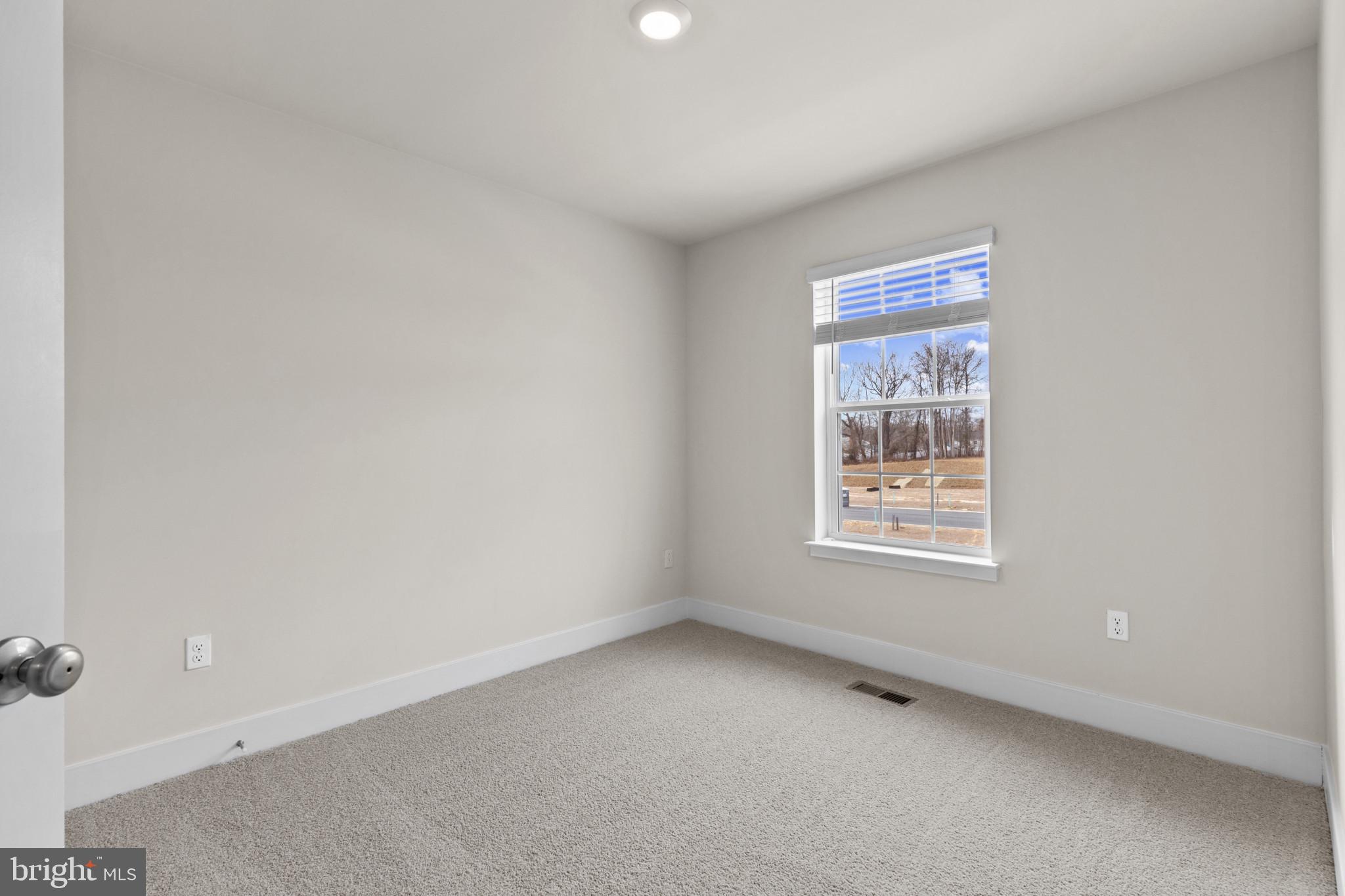 330 Hackley Drive Joppa, MD 21085 - Photo 20 of 32 an empty room with a window
