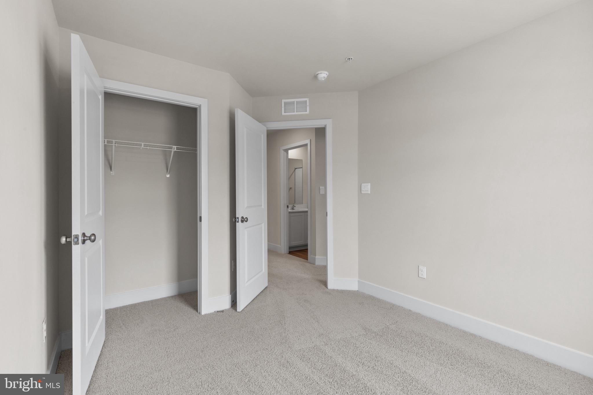 330 Hackley Drive Joppa, MD 21085 - Photo 23 of 32 an empty room with closet and a bathroom