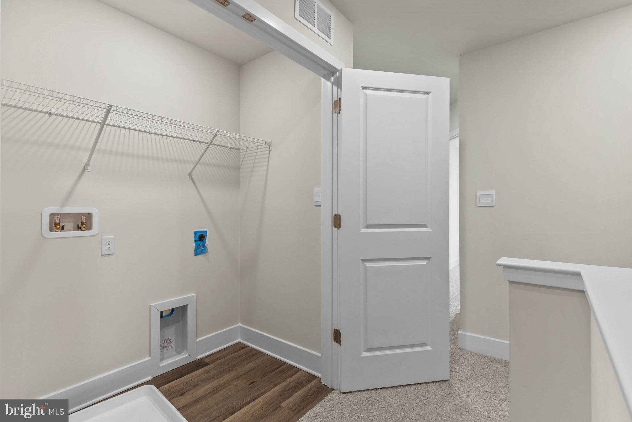 330 Hackley Drive Joppa, MD 21085 - Photo 24 of 32 a view of walk in closet with empty racks