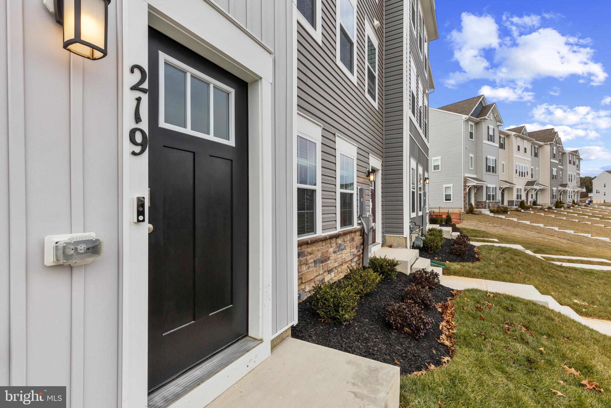 330 Hackley Drive Joppa, MD 21085 - Photo 4 of 32 a view of a street with a building