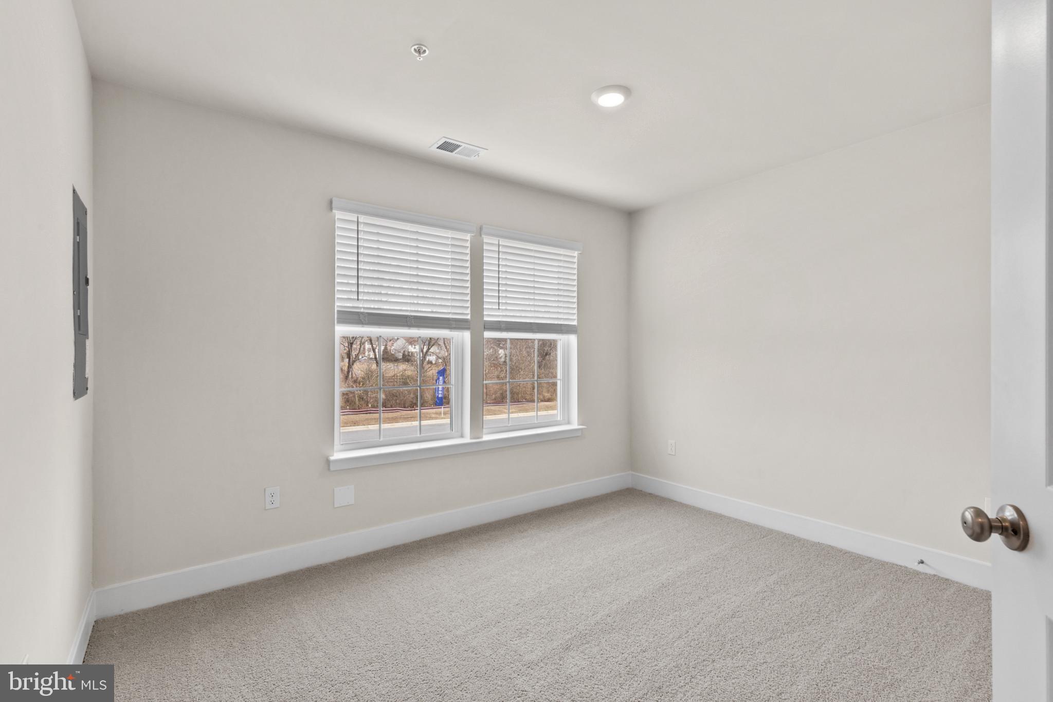 330 Hackley Drive Joppa, MD 21085 - Photo 6 of 32 an empty room with a window