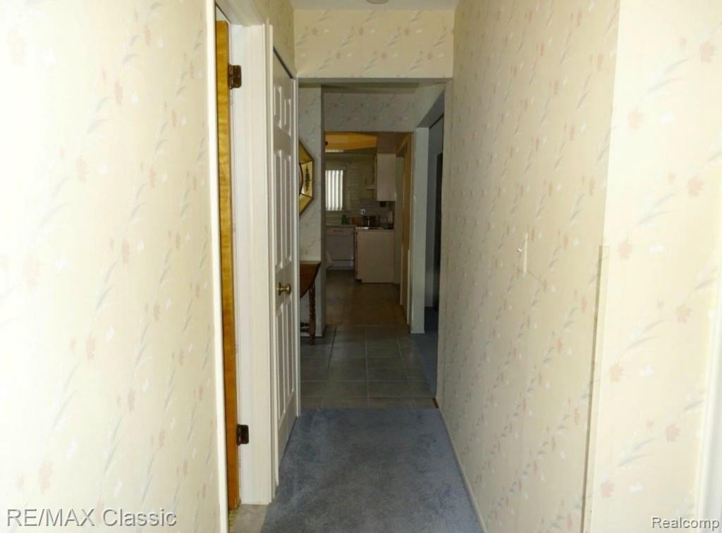 43952 Brandywyne Road Canton, MI 48187 - Photo 12 of 28 hallway leads to three bedrooms on the main floor