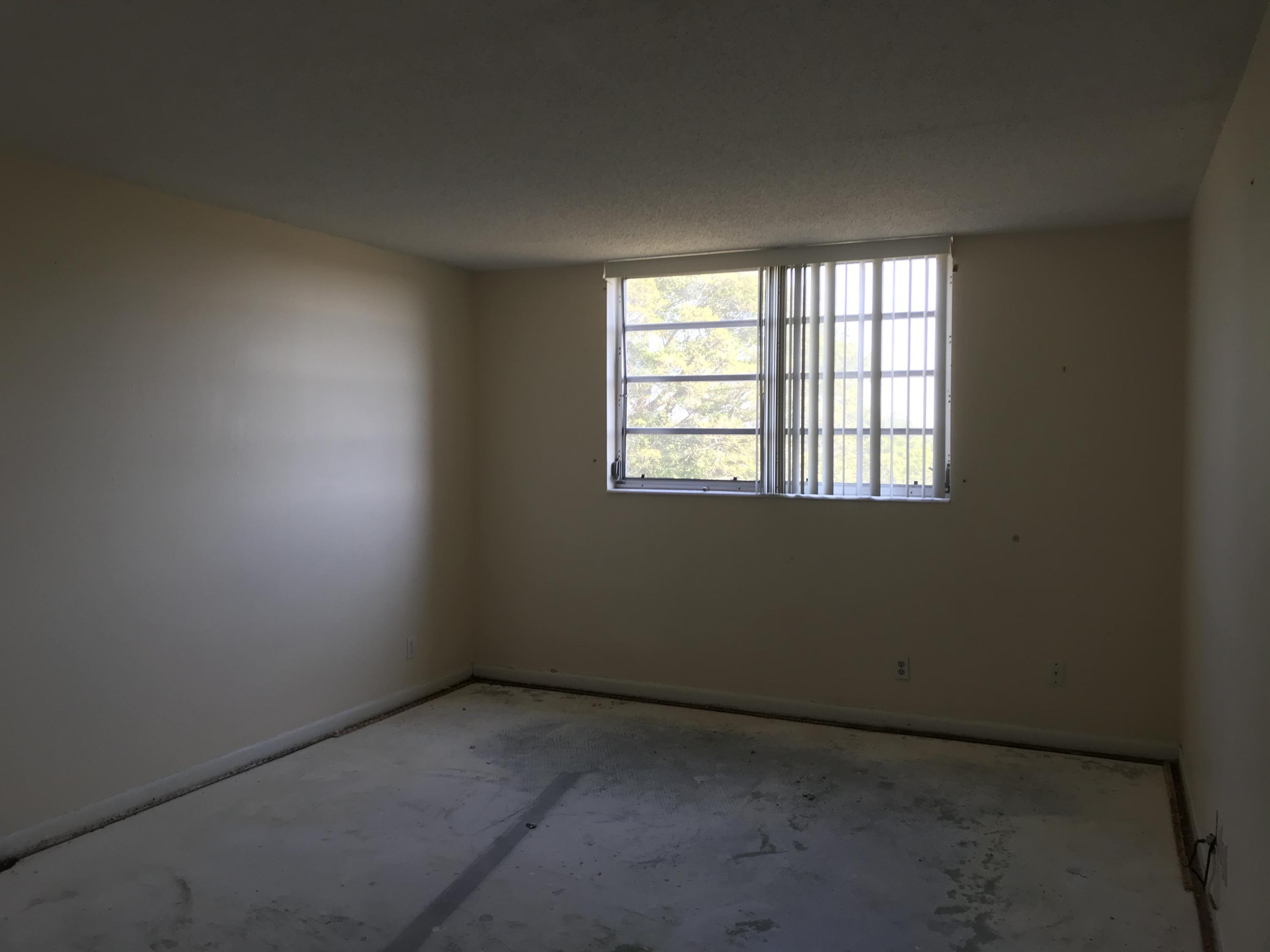 5500 Northwest 2nd Avenue, Unit 425 Boca Raton, FL 33487 - Photo 14 of 21 MASTER BEDROOM NO FLOORING