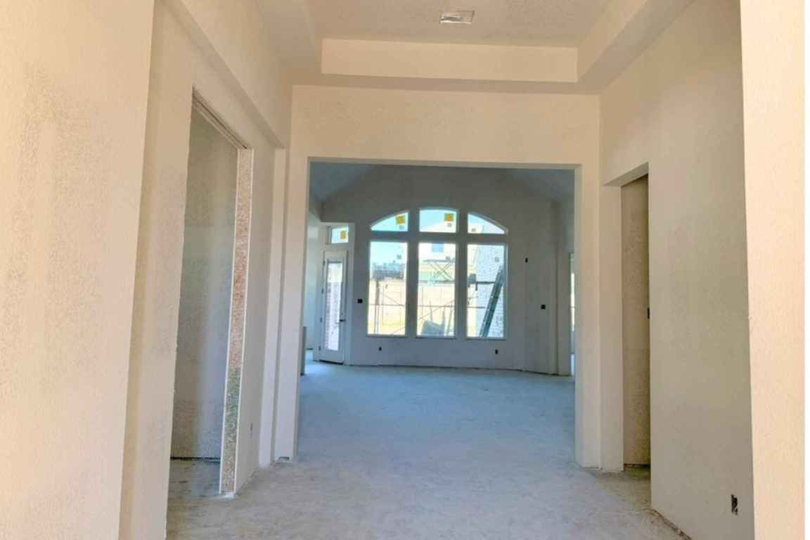 128 Sandrock Trail Georgetown, TX 78633 - Photo 2 of 34 a view of an empty room with a window