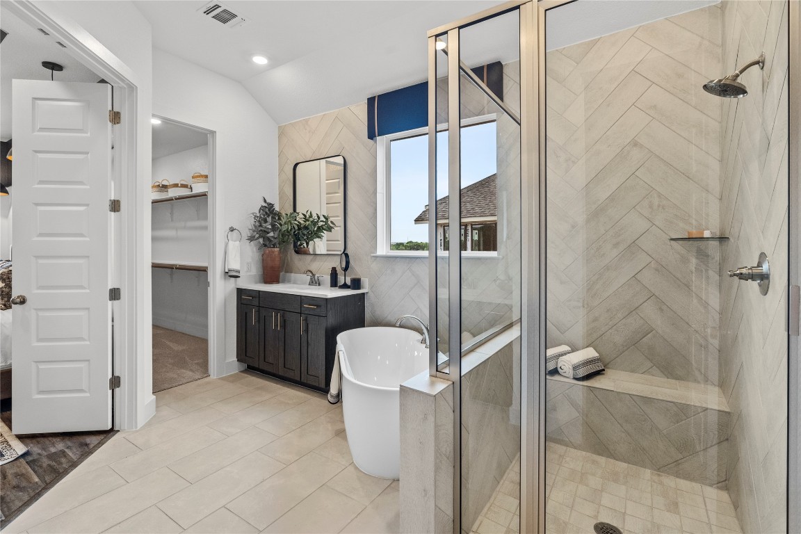 128 Sandrock Trail Georgetown, TX 78633 - Photo 29 of 34 a bathroom with a sink a toilet and shower