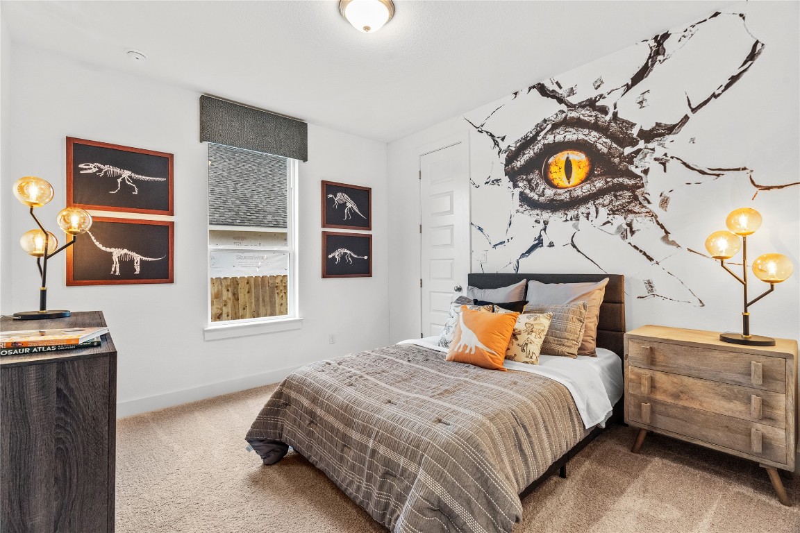 128 Sandrock Trail Georgetown, TX 78633 - Photo 33 of 34 a bedroom with bed and window