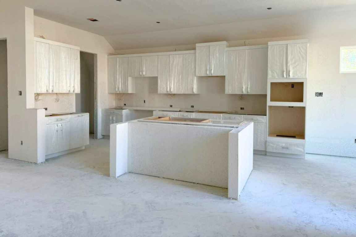 128 Sandrock Trail Georgetown, TX 78633 - Photo 4 of 34 a utility room with cabinets washer and dryer