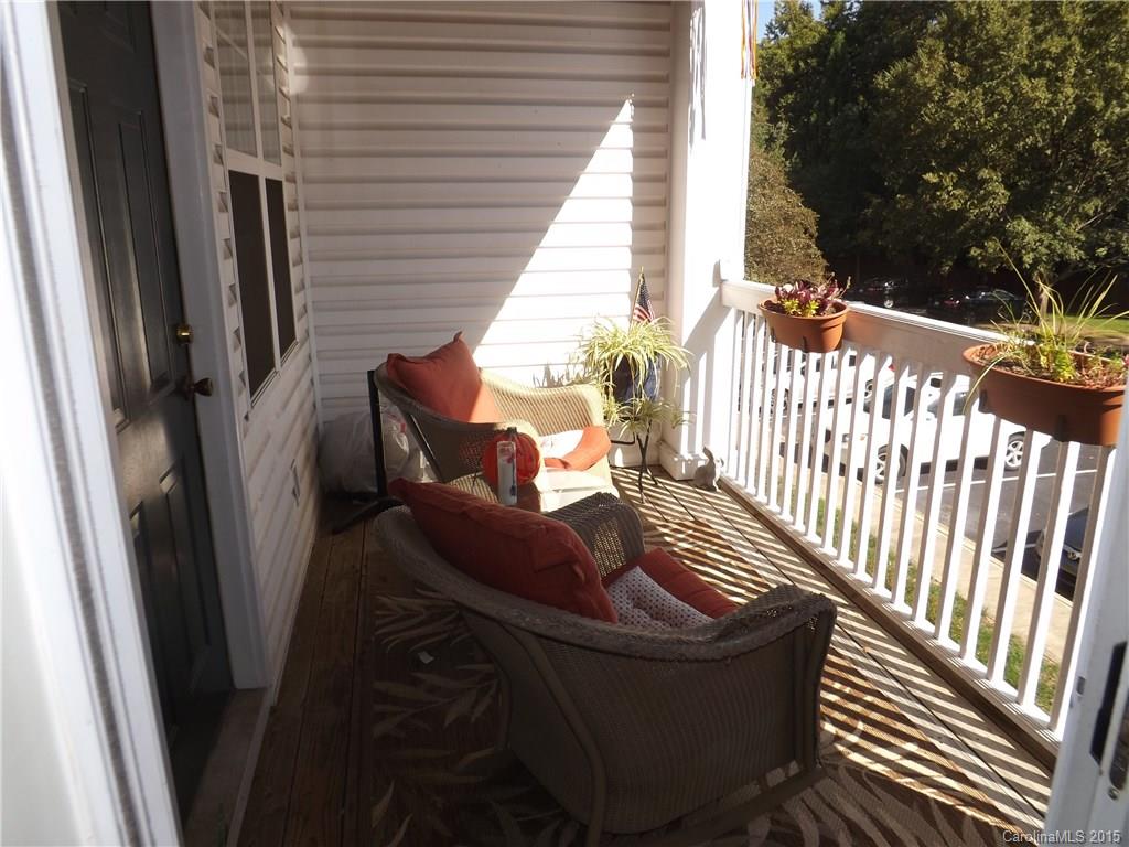 5601 Fairview Road, Unit 9 Charlotte, NC 28209 - Photo 13 of 13 a view of balcony and wooden floor