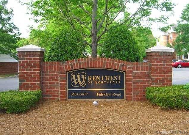 5601 Fairview Road, Unit 9 Charlotte, NC 28209 - Photo 3 of 13 a building with trees in front of it