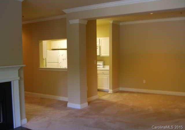 5601 Fairview Road, Unit 9 Charlotte, NC 28209 - Photo 6 of 13 an empty room with windows