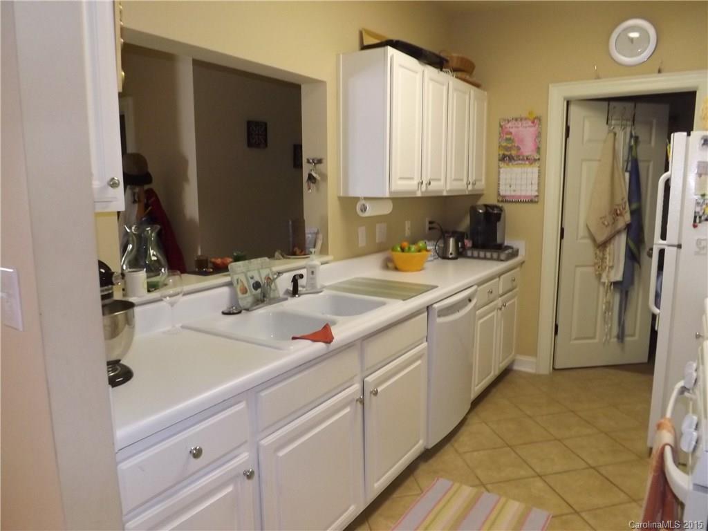 5601 Fairview Road, Unit 9 Charlotte, NC 28209 - Photo 7 of 13 a bathroom with a sink and a mirror