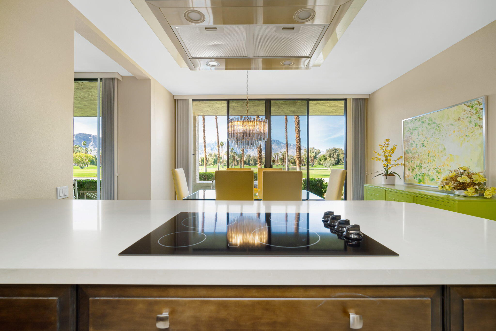 910 Island Drive, Unit 116 Rancho Mirage, CA 92270 - Photo 16 of 39 a living room with large window