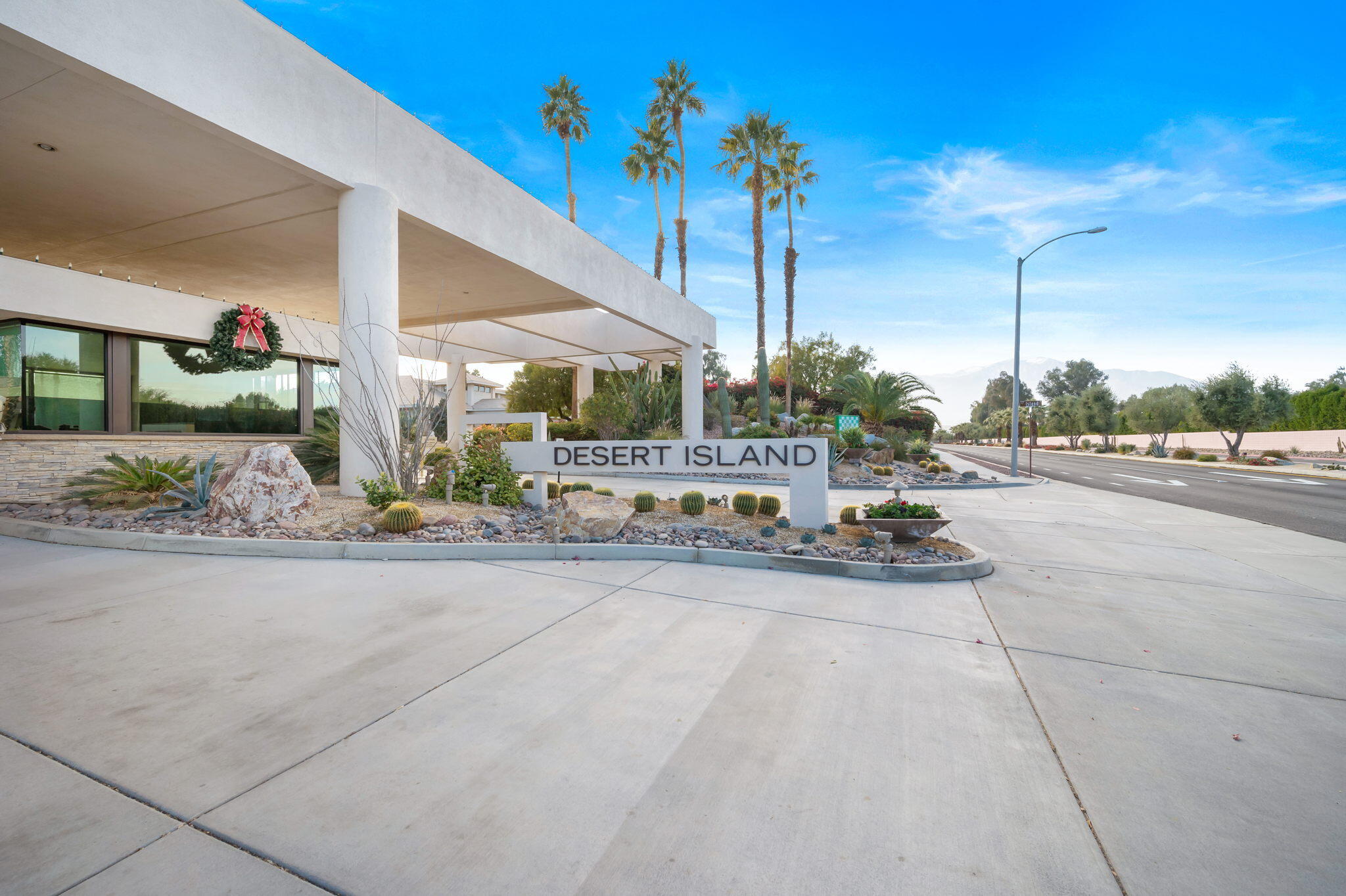 910 Island Drive, Unit 116 Rancho Mirage, CA 92270 - Photo 37 of 39 a view of a swimming pool with a yard