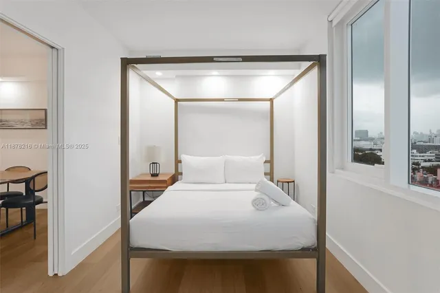 a en suite bathroom with a sink and a mirror