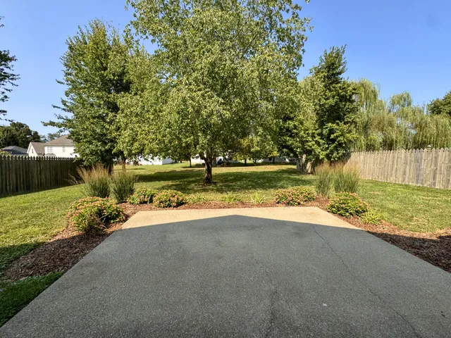 a view of a lake with a big yard