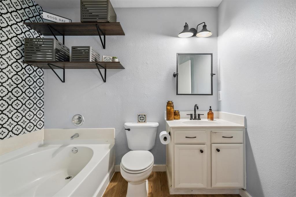 106 Rio Grande Drive Crandall, TX 75114 - Photo 26 of 40 a bathroom with a sink toilet and tub