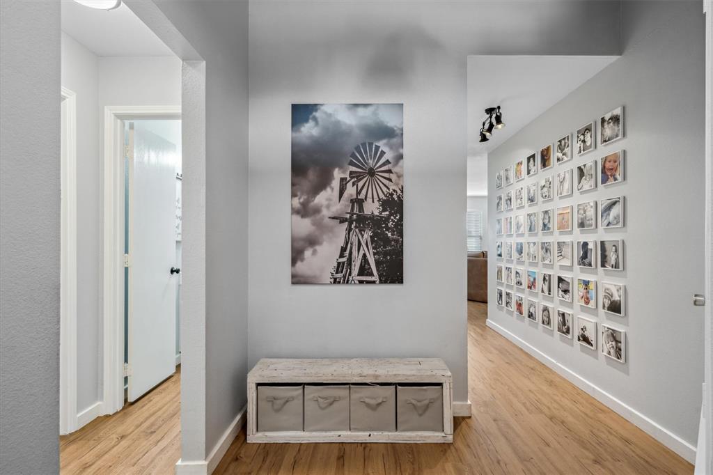 106 Rio Grande Drive Crandall, TX 75114 - Photo 27 of 40 a view of a hallway with wooden floor and closet