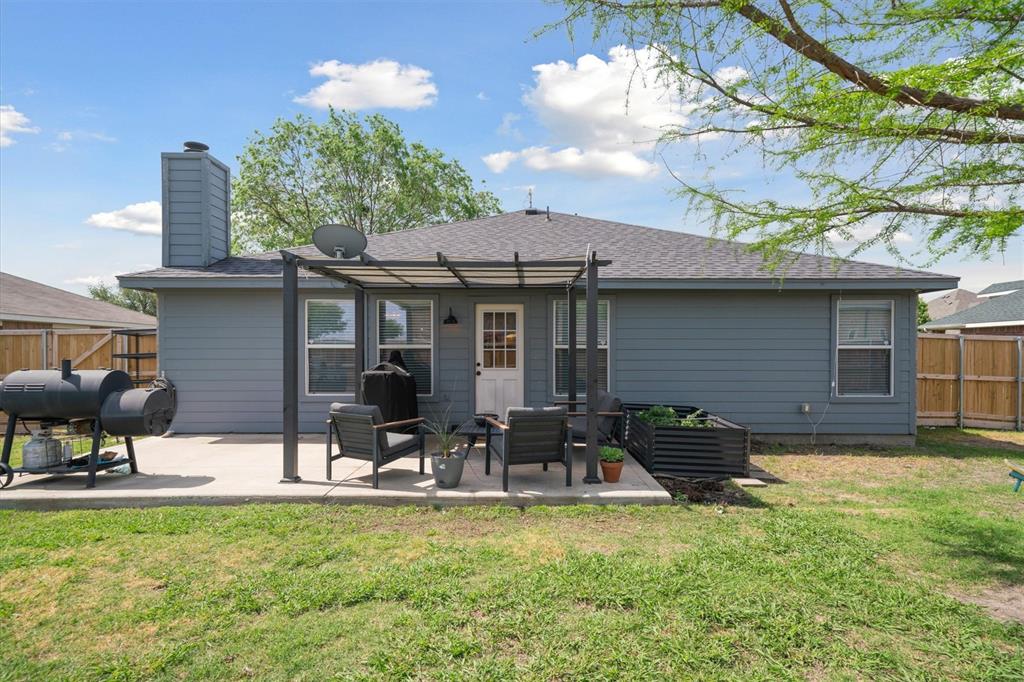 106 Rio Grande Drive Crandall, TX 75114 - Photo 37 of 40 a view of a house with backyard porch and sitting area