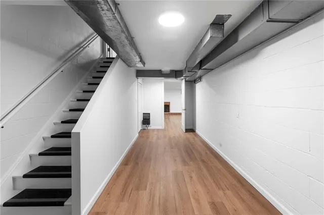 a view of entryway with wooden floor