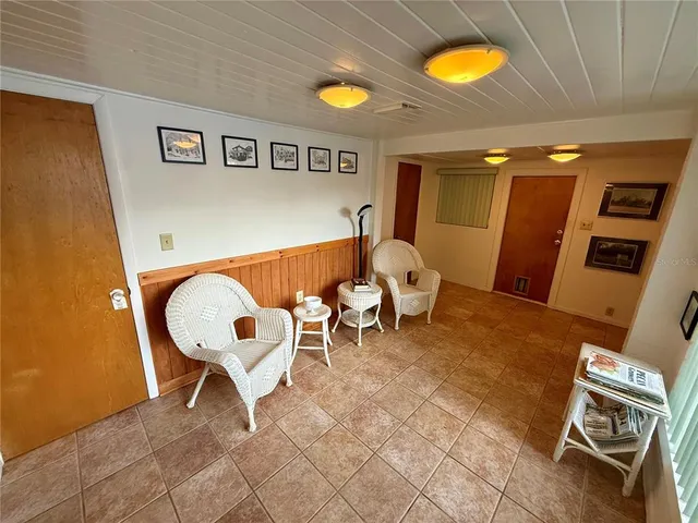 a view of room with window and a couch