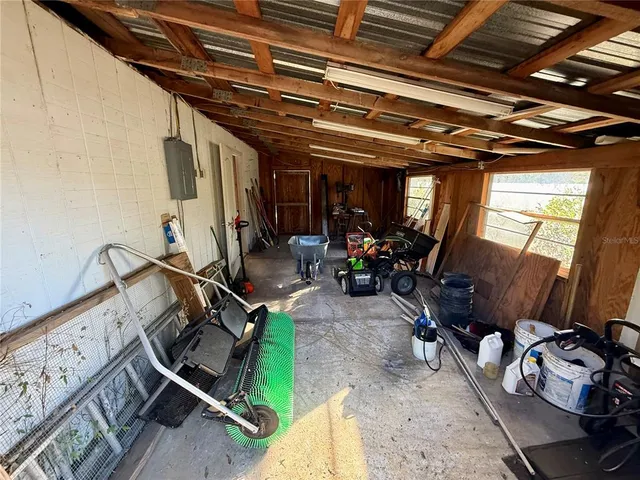 a view of a yard with an outdoor space