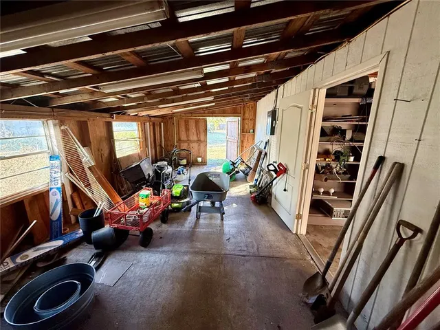 a view of a lake with houses in the back