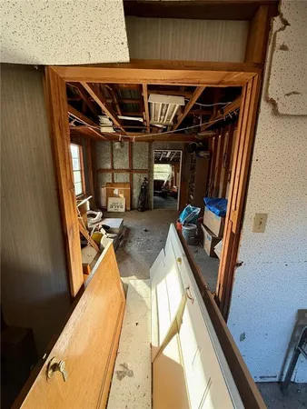 a view of outdoor space with green field and trees all around