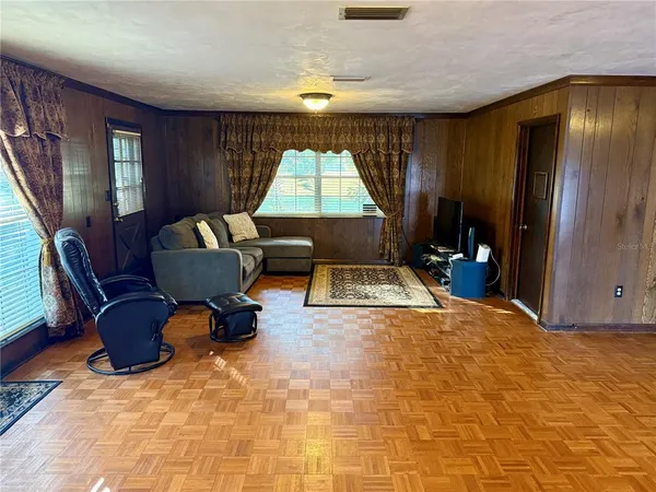 a kitchen with stainless steel appliances granite countertop a sink counter and cabinets
