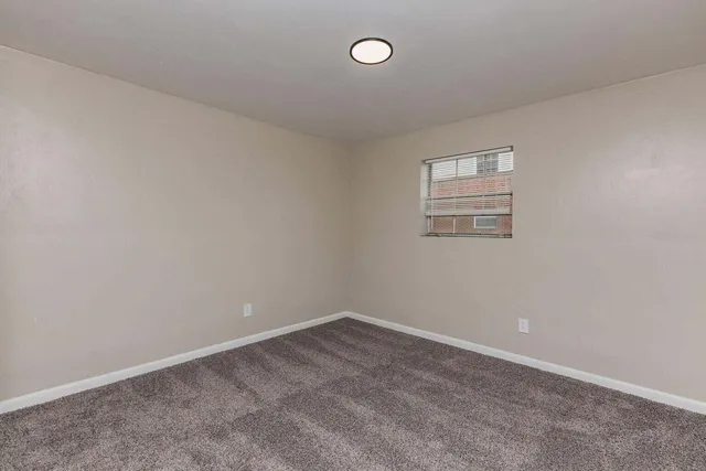 an empty room with a workbench
