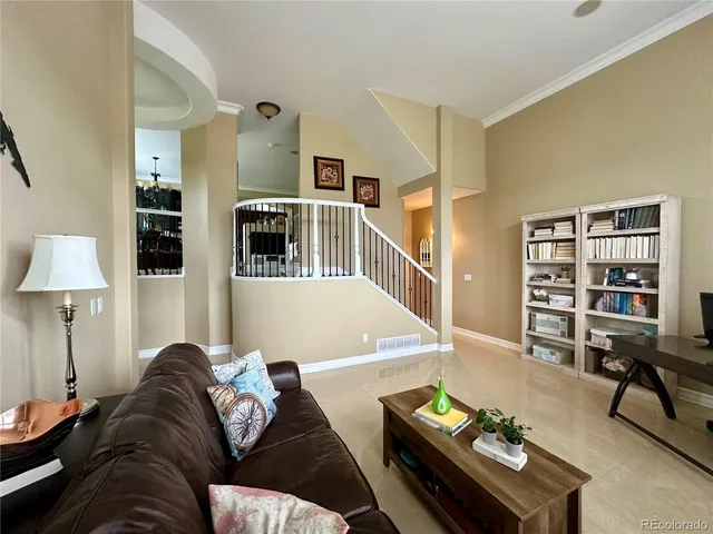 a living room with furniture and a couch
