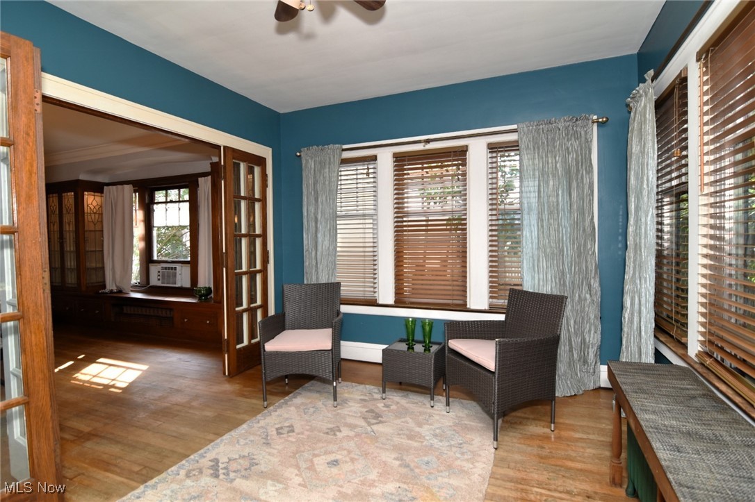 17930 Rosecliff Road Cleveland, OH 44119 - Photo 16 of 50 Living area with ceiling fan and wood finished floors