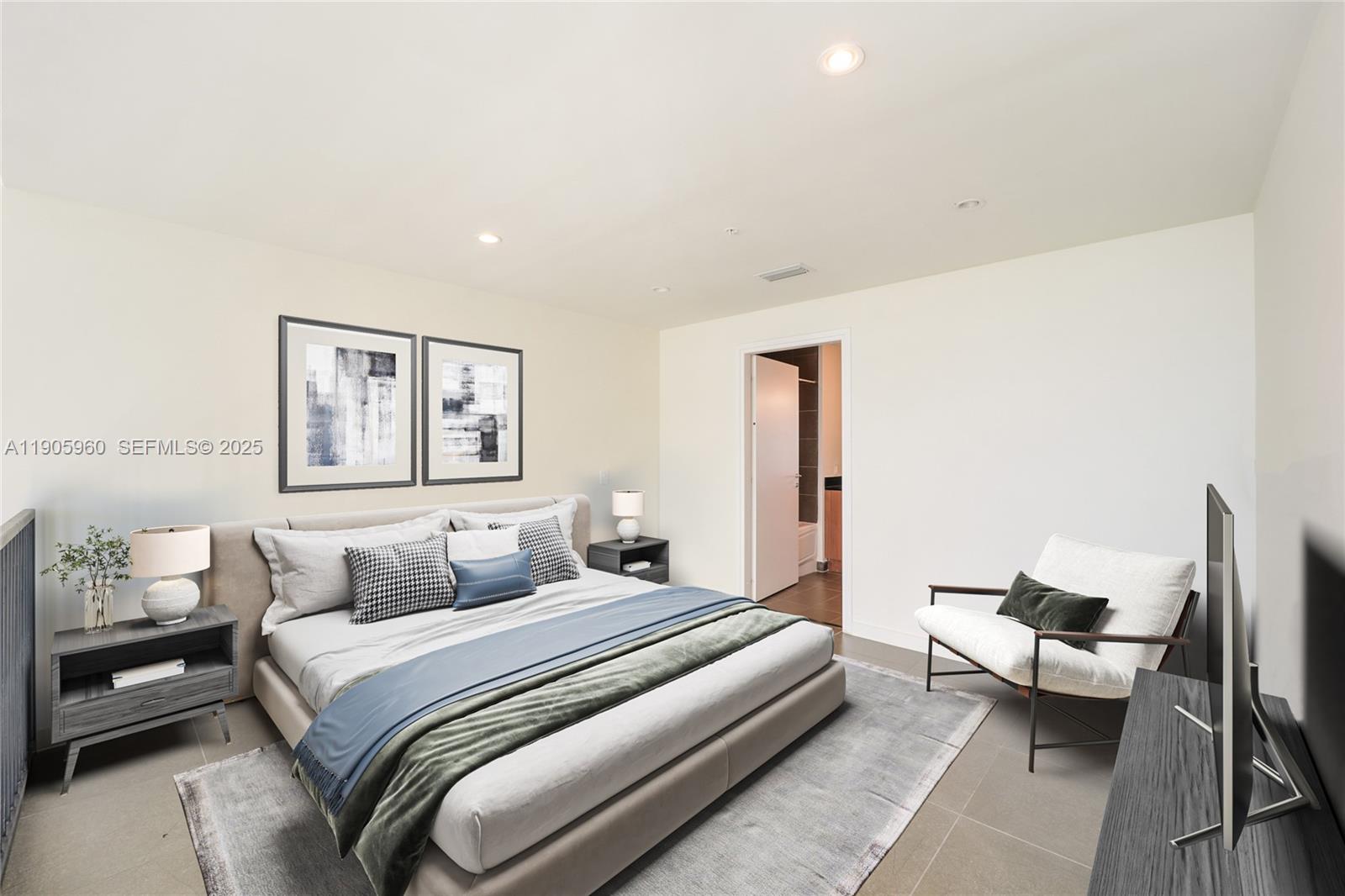 300 South Biscayne Boulevard, Unit L414 Miami, FL 33131 - Photo 11 of 21 a bedroom with a bed and wooden floor