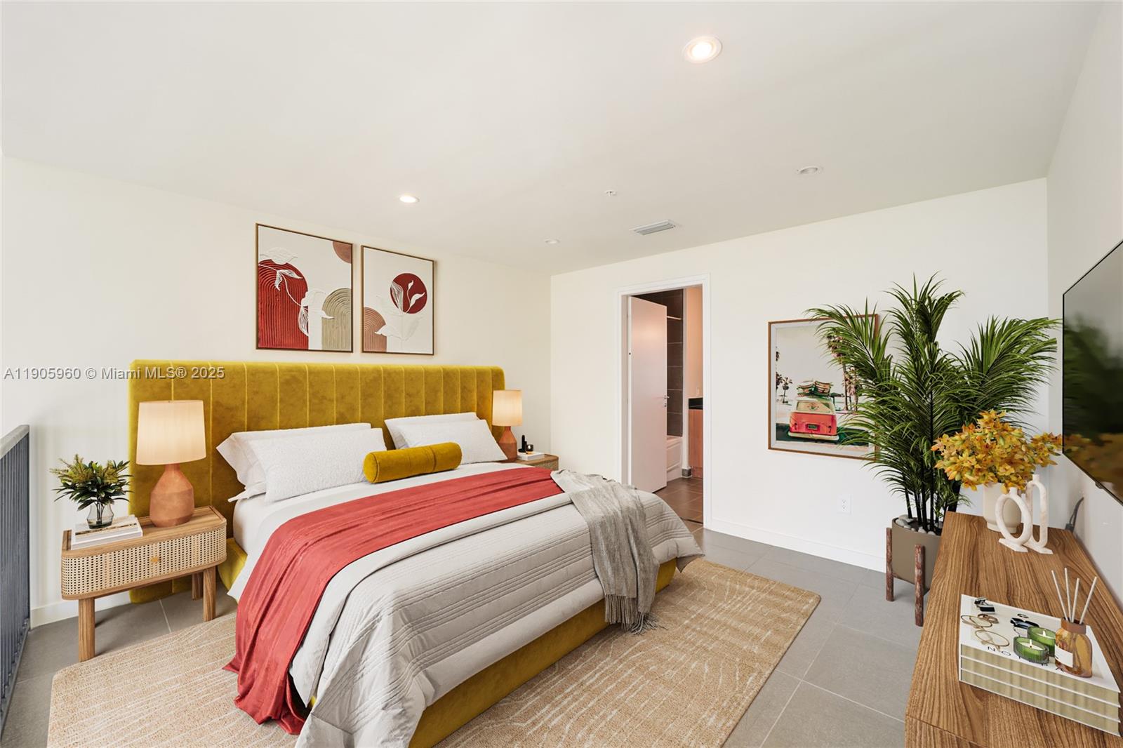 300 South Biscayne Boulevard, Unit L414 Miami, FL 33131 - Photo 12 of 21 a bedroom with a bed and a potted plant