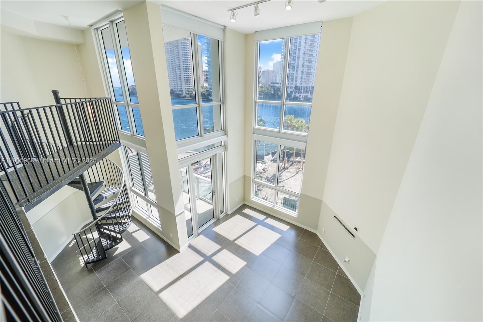 300 South Biscayne Boulevard, Unit L414 Miami, FL 33131 - Photo 18 of 21 a view of an entryway with wooden floor