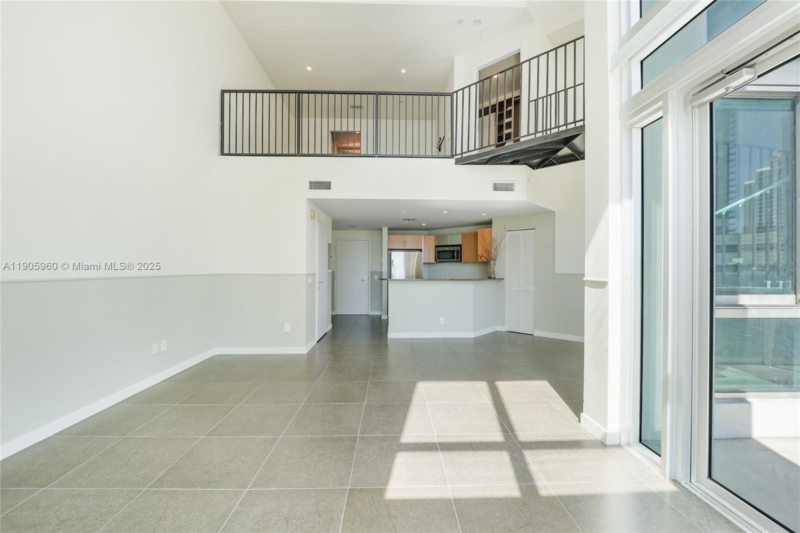 300 South Biscayne Boulevard, Unit L414 Miami, FL 33131 - Photo 19 of 21 a view of entryway and kitchen