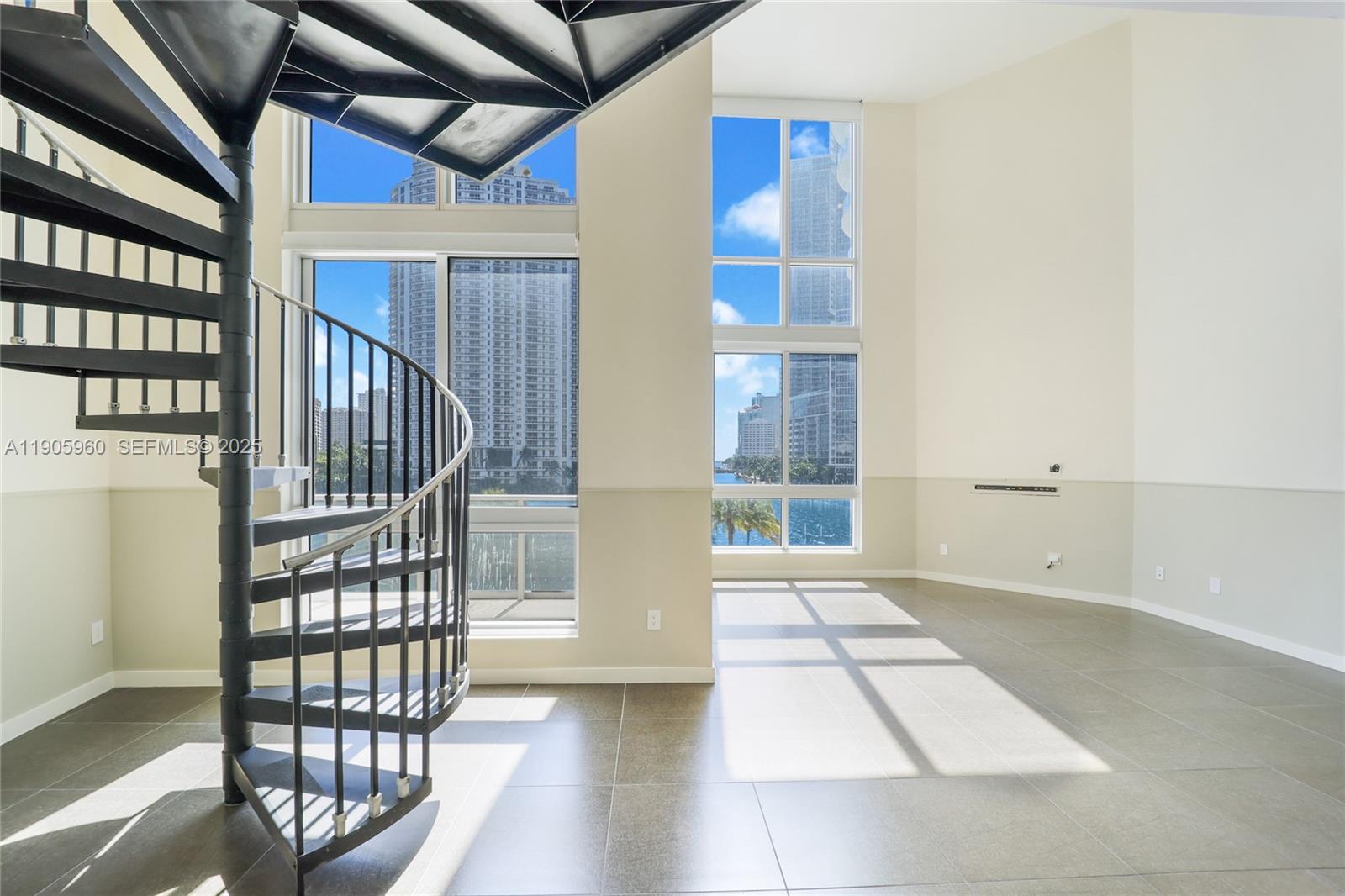 300 South Biscayne Boulevard, Unit L414 Miami, FL 33131 - Photo 3 of 21 a view of an entryway with staircase