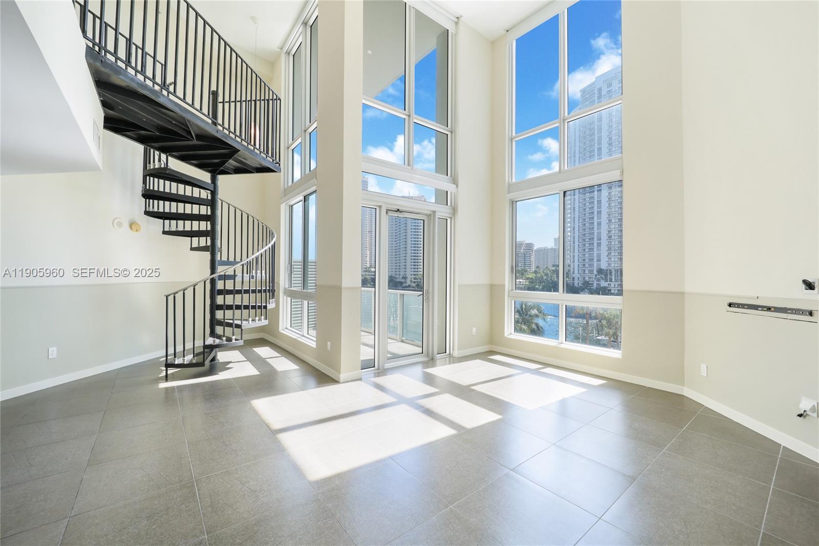 300 South Biscayne Boulevard, Unit L414 Miami, FL 33131 - Photo 6 of 21 a view of entryway and hall with wooden floor