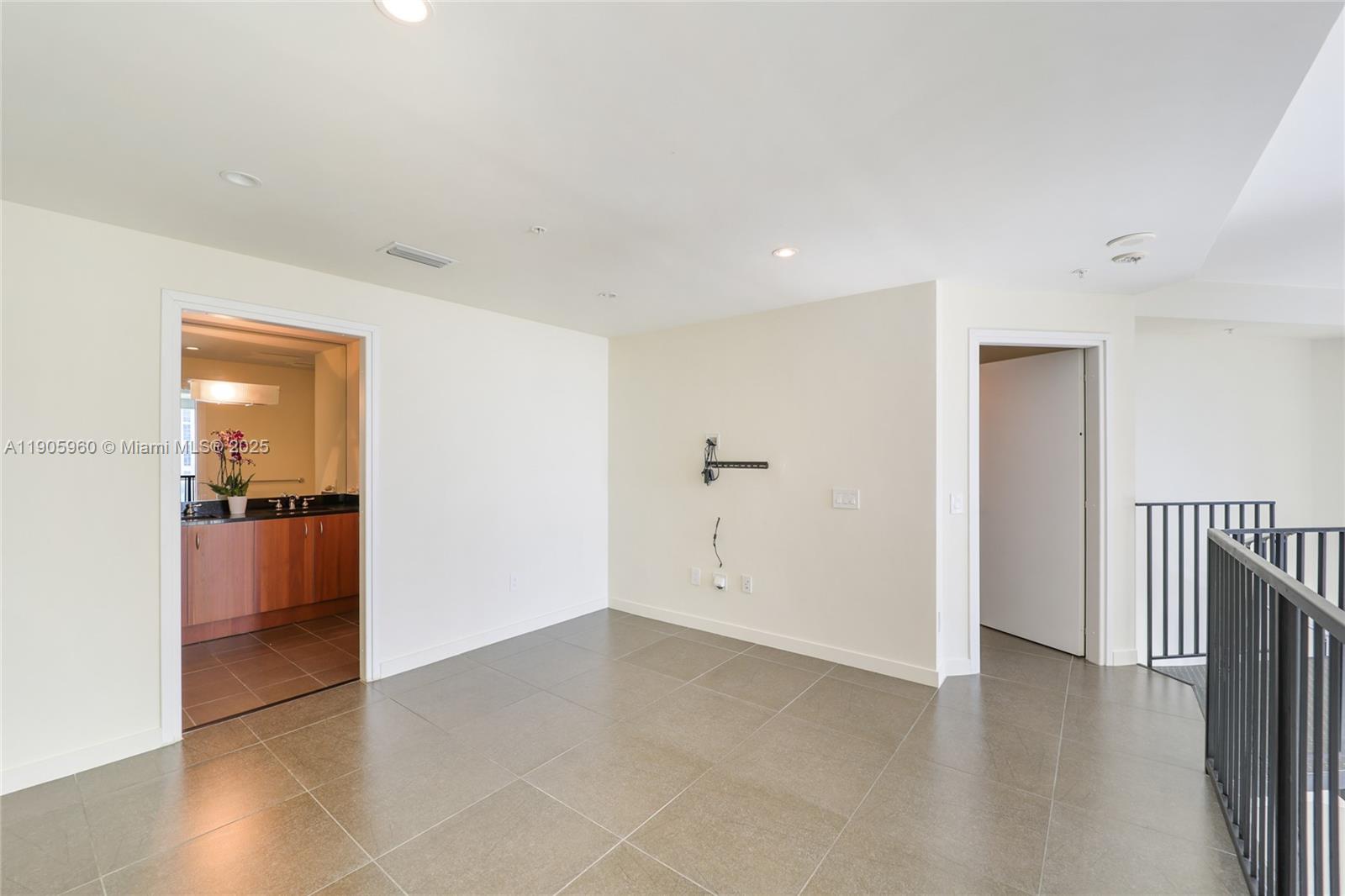 300 South Biscayne Boulevard, Unit L414 Miami, FL 33131 - Photo 10 of 21 a view of a hallway with wooden floor