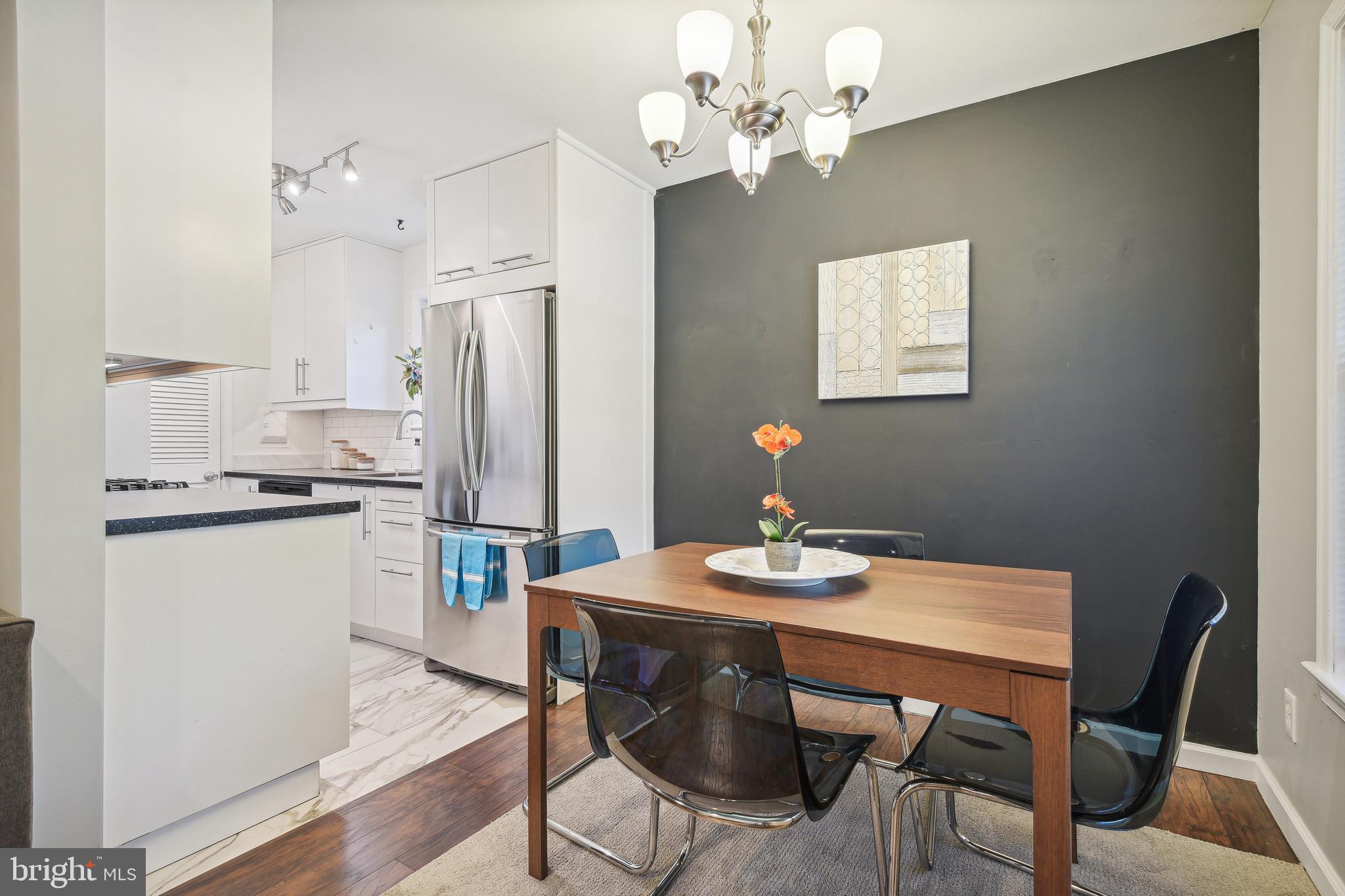 1925 Lyttonsville Road, Unit 1925 Silver Spring, MD 20910 - Photo 11 of 24 Easy access from kitchen to dining room