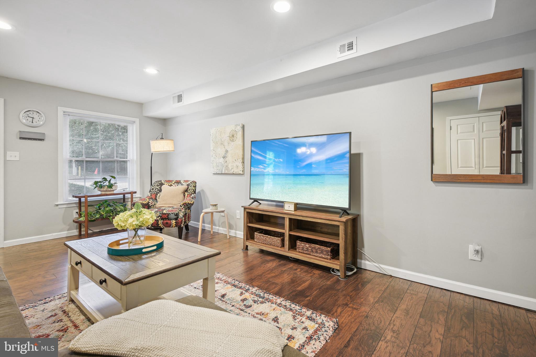 1925 Lyttonsville Road, Unit 1925 Silver Spring, MD 20910 - Photo 7 of 24 Open living room with recessed lighting