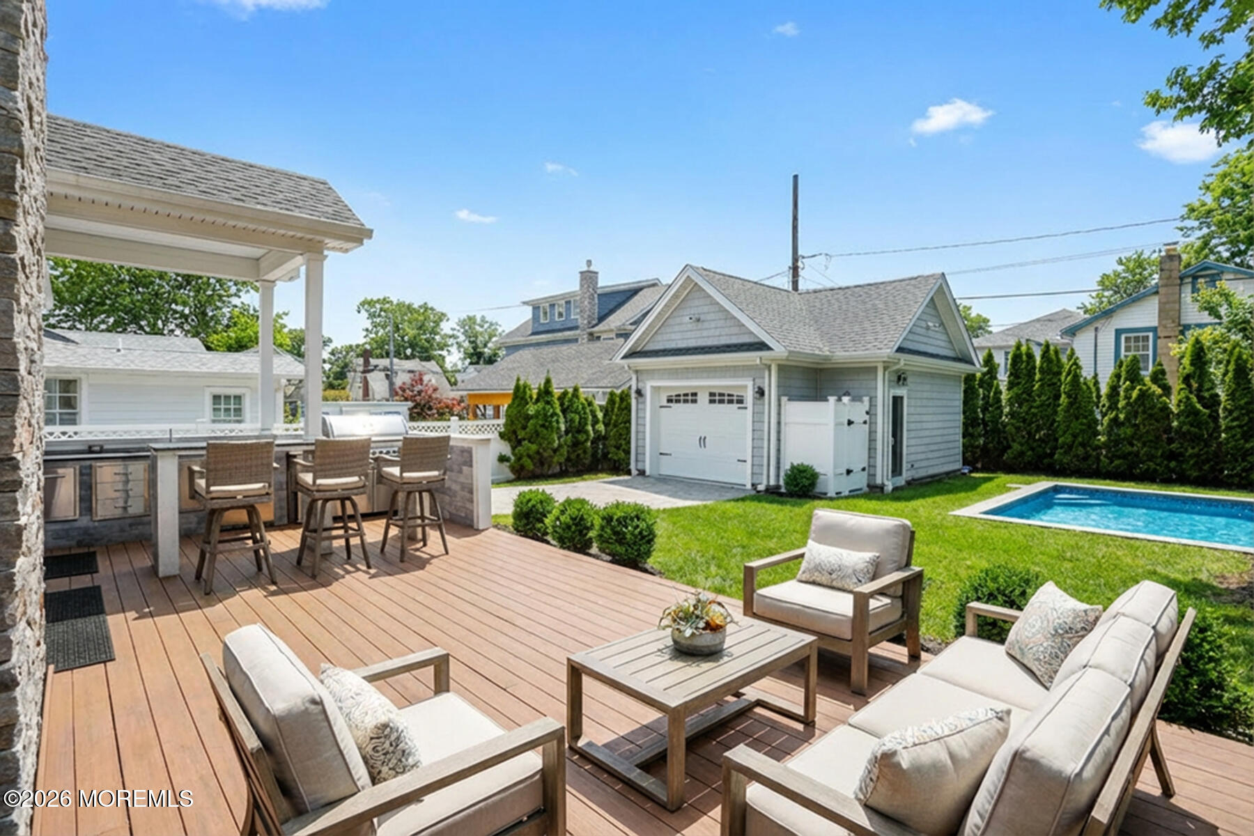 420 Ludlow Avenue Spring Lake, NJ 07762 - Photo 49 of 66 Deck Overlooks Pool & Yard!