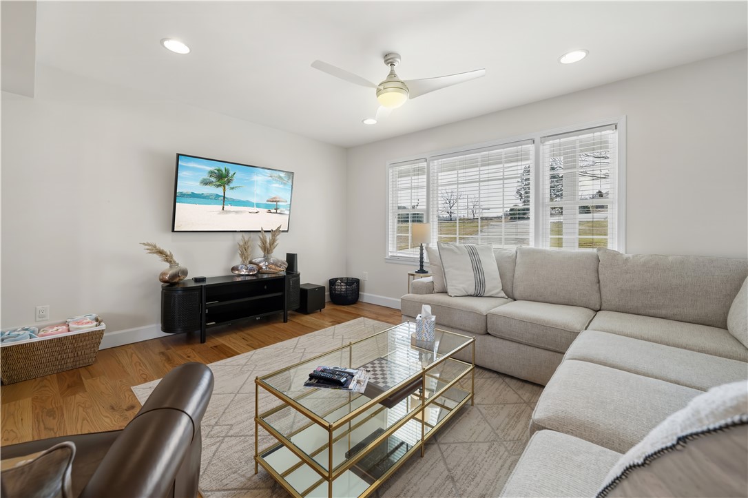 Bright and airy living room with warm hardwood floors.