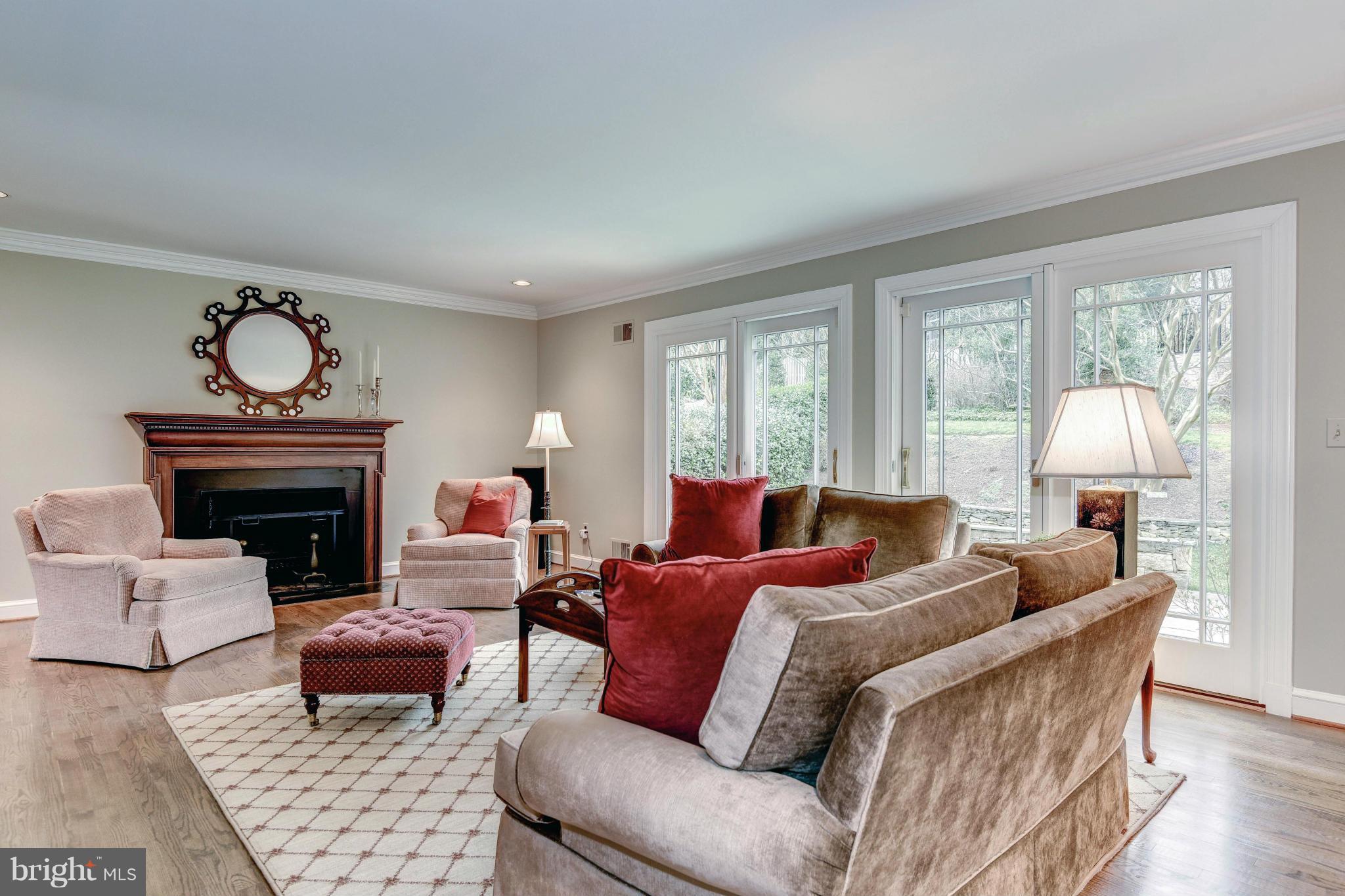4907 Baltan Road Bethesda, MD 20816 - Photo 6 of 26 Cozy Family Room w/ Wood-burning Fireplace