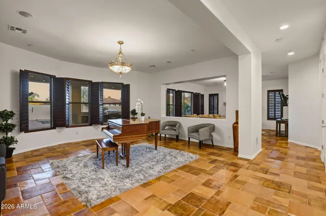 a living room with furniture and window