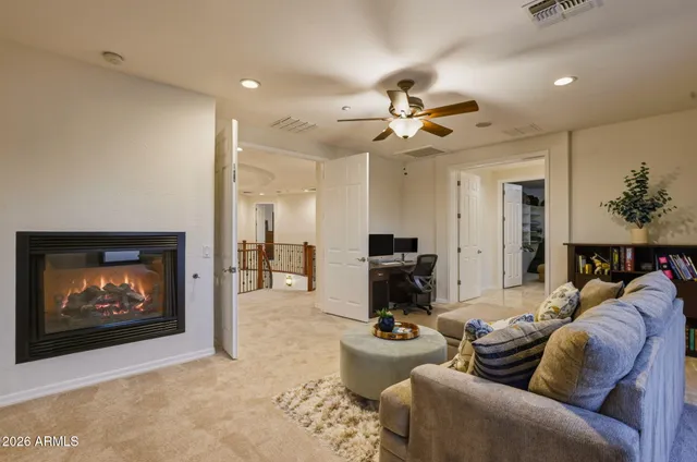 a spacious bedroom with a large bed and a window