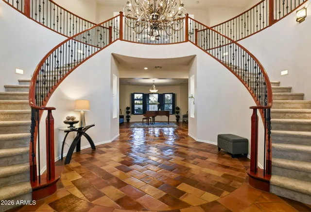 a view of a patio with swimming pool table and chairs