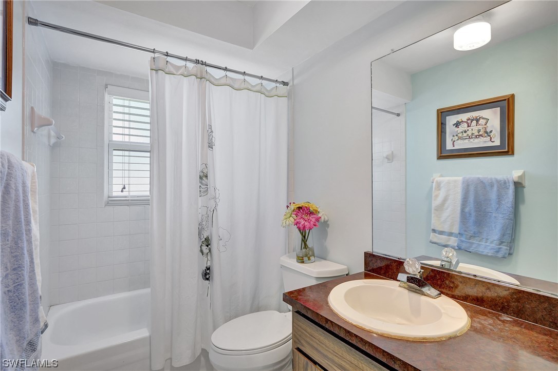 17508 Laurel Valley Road Fort Myers, FL 33967 - Photo 25 of 36 a bathroom with a sink toilet and shower