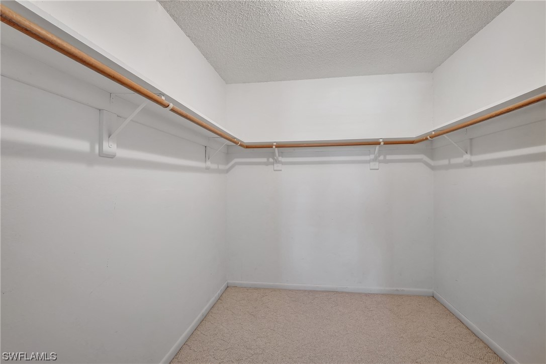 17508 Laurel Valley Road Fort Myers, FL 33967 - Photo 26 of 36 a view of an empty walk in closet
