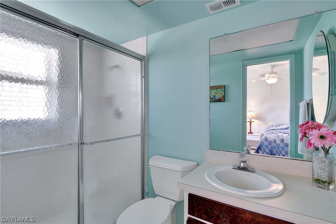 17508 Laurel Valley Road Fort Myers, FL 33967 - Photo 30 of 36 a bathroom with a sink toilet and shower